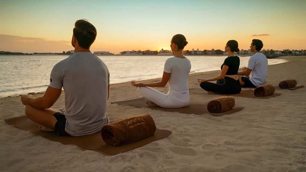 Fairmont The Palm_Dubai with Travelling Athletes _yoga on the beach - Fitness Holiday Dubai - Fitness Holiday Dubai